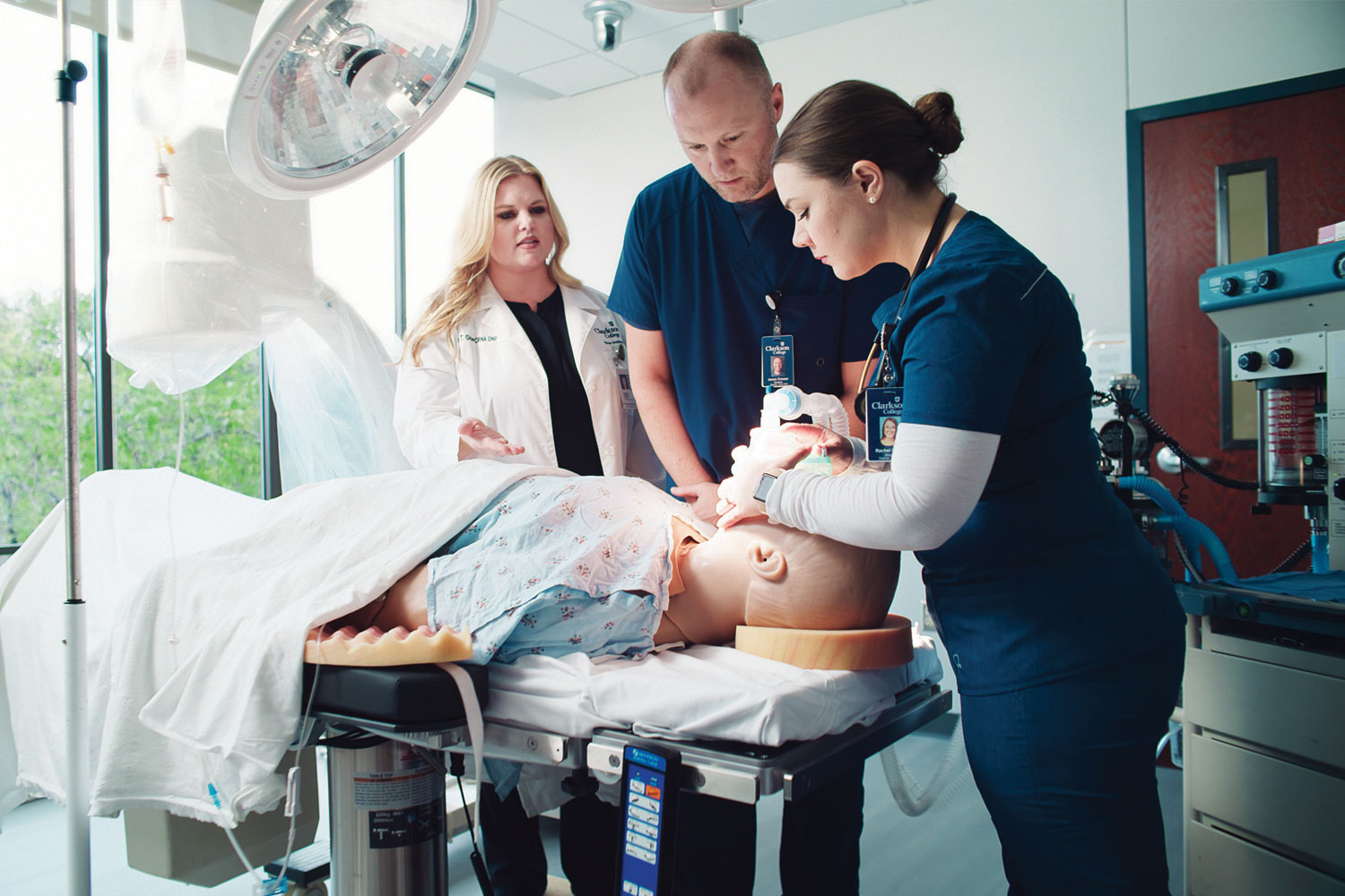 Students practicing skills in the OR