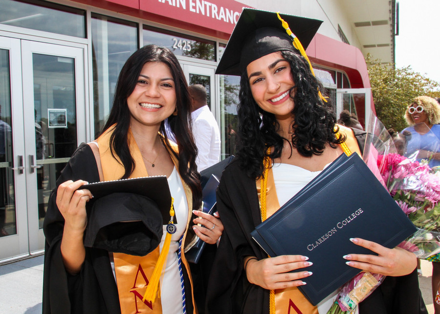 Students celebrating at commencement.